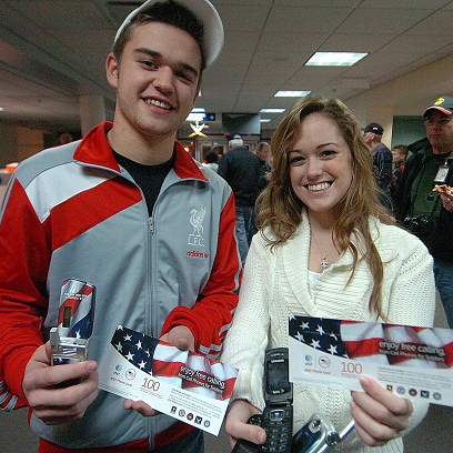 Robbie and Brittany Bergquist with calling cards during CNN appearance.